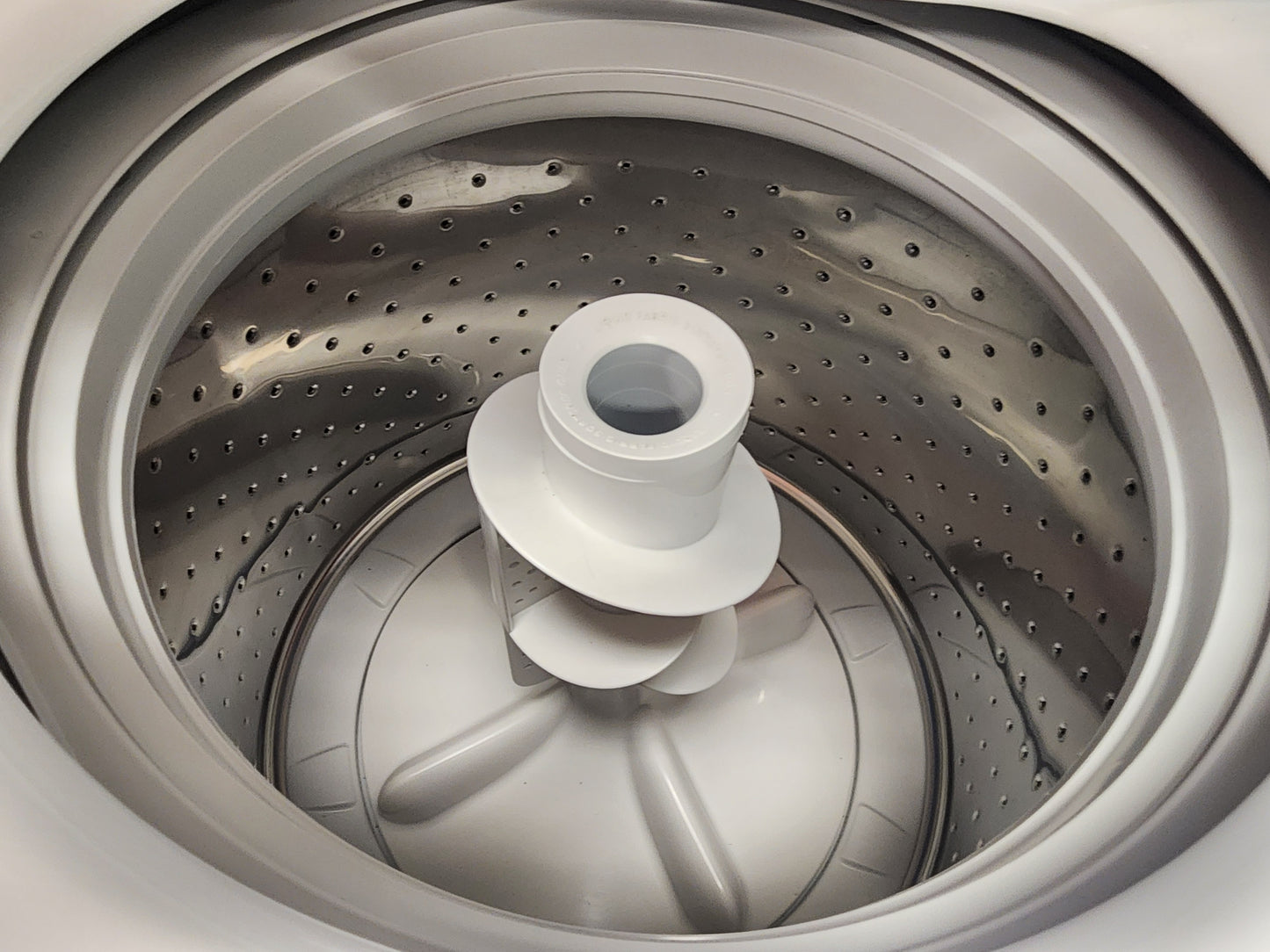 W-932G. Ge washer. One year warranty 2 repair in the one year time frame,you are responsible to bring the washer back into the store for any repairs.We do not cover the springs due to over loading of the washer we put new springs in it.