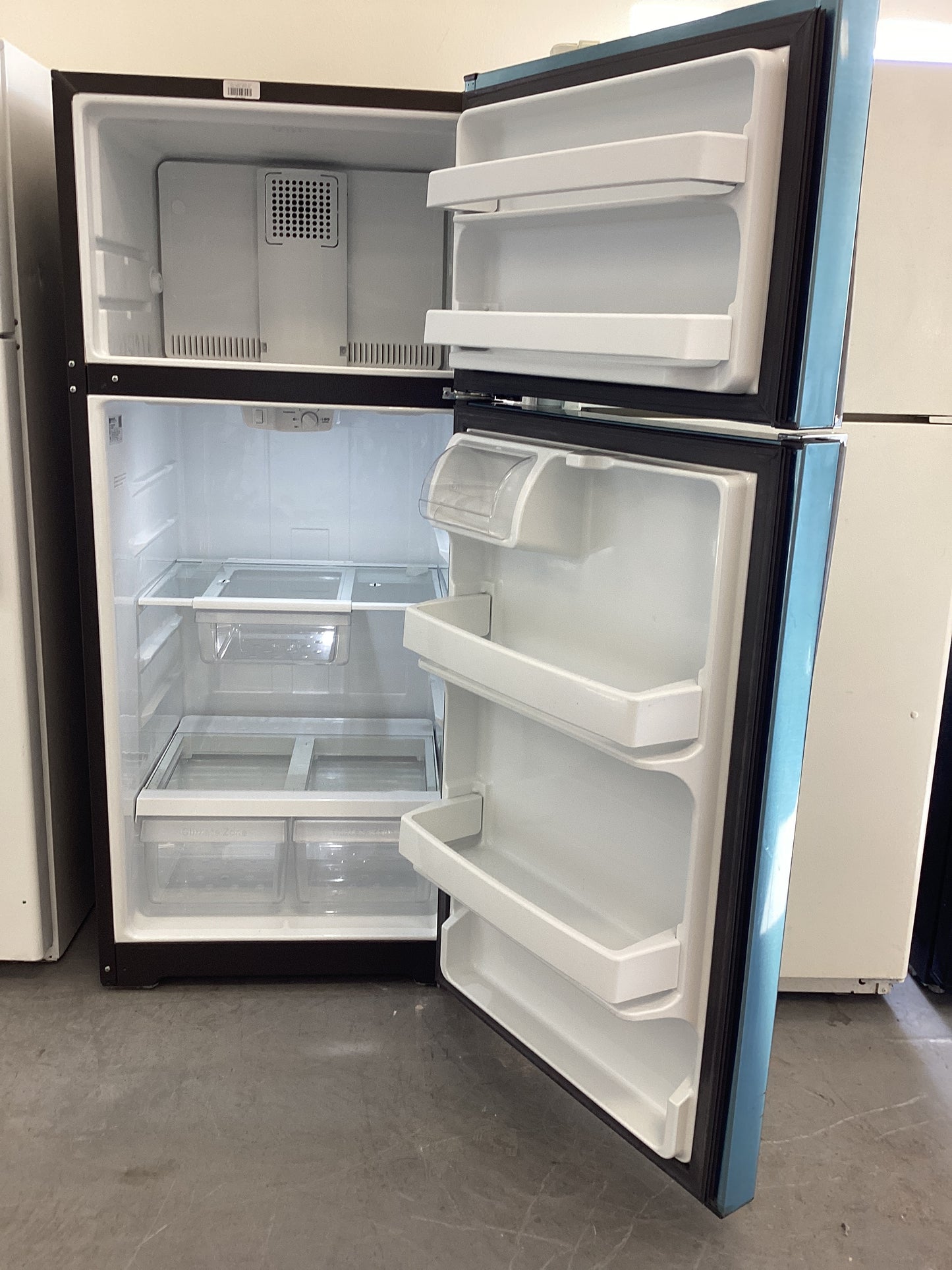 *RTBSS-3854 GE BLACK AND STAINLESS REFRIGERATOR